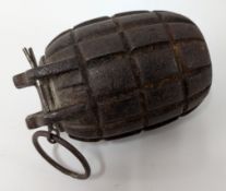 A WWI or WWII inert practice hand grenade or 'Mill's' grenade, used for teaching purposes.