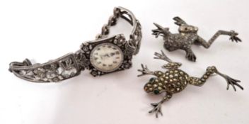 A silver ladies dress watch, together with a silver frog brooch and another unmarked. (3)