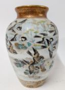 A Japanese Kutani-ware vase, late Meiji Period, decorated with birds and gilt paint, height 31.5cm.