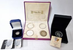 Pobjoy Mint, a set of four silver Harry Potter coins, cased (one missing protective plastic),