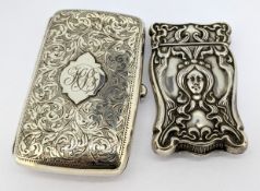 A Victorian foliate engraved cigarette case, hallmarked Chester 1898, together with another of Art
