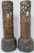 A pair of large Japanese bamboo pots with carved and painted figures together with mother of pearl