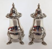 A pair of silver pepper shakers, hallmarked Birmingham 1946, total weight 6.5oz.