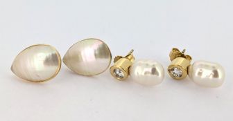 A pair of 14ct and pearl earrings together with a pair of silver gilt earrings (4).