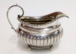 A George III silver milk jug, hallmarked rubbed, probably London 1818, weight approx. 7.51oz.