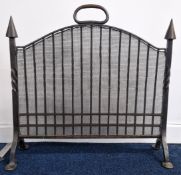 A cast iron gothic style fireguard, with pointed finials, width approx 62cm.