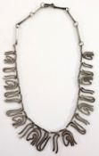 A silver fringe necklace of abstract design, marked 'Quitoecua 925 silver', approx 50.7g.