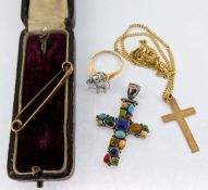 A 9ct gold cross and chain, 9ct gold and glass stone ring, 9ct gold brooch total weight 10.9g