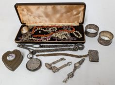 A collection of costume jewellery including a pearl necklace, coral necklace, together with
