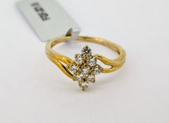 Gemporia, a natural yellow diamond cluster ring, set in 9ct yellow gold, size Q, with certificate of