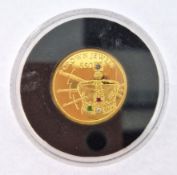 A Sierra Leone Fifty dollar 24ct gold coin, The Crown Jewels proof coin, embedded with four precious