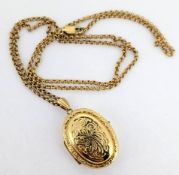 A 9ct gold locket, on a 9ct gold chain, approx 10.3g.