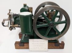 A scale model of the 1963 Westbury Wyvern Hit and Miss Engine by E T Westbury, dark green painted,