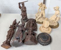 A collection of carved wooden figures.