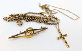 A 9ct gold chain, a 9ct gold brooch, a 9ct gold cross and chain approx 9.3g.