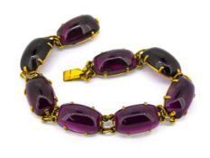 An antique garnet set bracelet, set in gold, length approx 19cm.