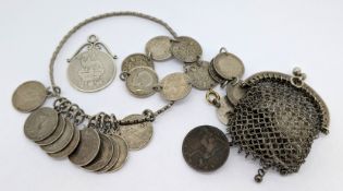 A silver bangle set with silver coins, three pence bracelet etc.