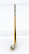 A gold and platinum golf club brooch set with a single pearl as a golf ball, approx 6.9g.