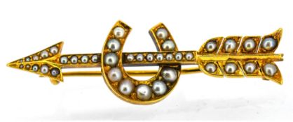 An antique pearl horseshoe and arrow brooch, mounted in 15ct yellow gold.