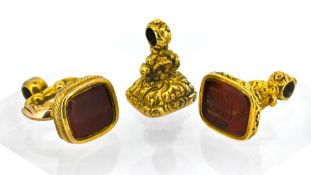 Three Antique fobs each set with hardstone (possibly gold).