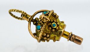 A Victorian gold and turquoise set watch key, approx 3.4g.