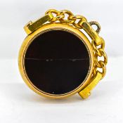 An antique 15ct gold swivel fob, set with bloodstone and carnelian. Total weight approximately 7.7g