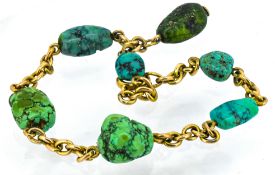A turquoise nugget bracelet, set in 9ct yellow gold, total weight approx 10g.