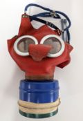 A WWII small child's 'Mickey Mouse' gas mask, boxed.