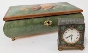 A small painted metal desk clock, with floral details, marked to dial 'Silversmiths and Goldsmiths