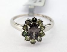 Gemporia, a Arusha colour change garnet set ring, set in 9k white gold, size S, with certificate