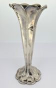 An early 20th century silver spill vase, hallmarked Birmingham 1911, filled, total weight approx