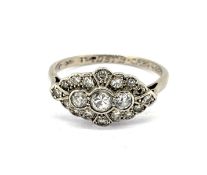 A diamond set cluster ring, set in 18ct white gold, size L/M, approx 3g.