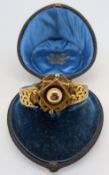 A late Victorian bangle, possibly late 1880's, badly repaired, possibly pinchbeck?