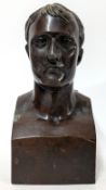 A bronze bust of Napoleon, 19th century style, on a square base, height approx 26cm.