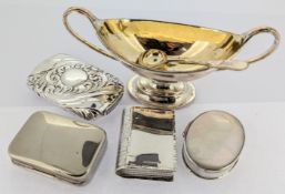 A silver salt boat, together with a silver spoon and vesta case, together with three silver plated