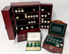 A large commemorative coin display case, together with two others to include 'The Complete Susan