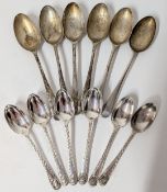 Two sets of six silver teaspoons, hallmarked Sheffield 1907/1911, total weight approx 5.8oz.