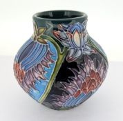 A Moorcroft Saadian pattern miniature vase, marked to base 'c. 2001', height approx 8cm, boxed.