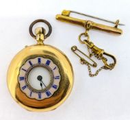 A French small full hunter pocket watch, set in 18k yellow gold, pendant wind and T Bar brooch,