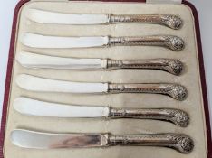 A set of six silver handled fruit knives, hallmarked Sheffield, in a fitted case, total weight