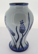 A Moorcroft Muscari pattern miniature vase, marked to base 'c. 2004', height approx 9.5cm, boxed.