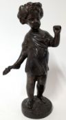 A bronze figure of a harvest boy of putti, missing back tool, height approx 21cm.