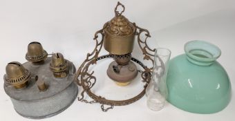 A blue glass and brass hanging lamp, together with a ceiling brass chandelier with urn decoration to