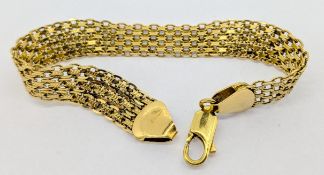 A gold bracelet, set in 18ct gold, approx 18.7g.