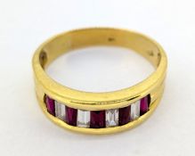 A 14ct yellow gold dress ring, set with red and white stones, approx 4.6g.