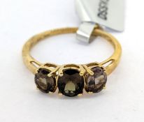 Gemporia, a Arusha colour change garnet set ring, set in 9k yellow gold, size N/O, with