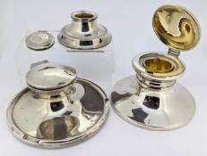 Three silver capstan inkwells, the smaller broken, total weight approx 17.1oz (filled).