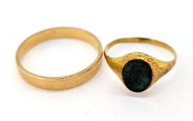 A gold wedding band ring (indistinct marks) together with a small bloodstone ring (not marked)