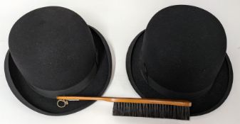 A pair of bowler hats, one by Moss Bros, together with brush. (3)