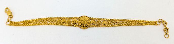 A gold filigree and beaded bracelet, set in 22ct gold, approx 13g.